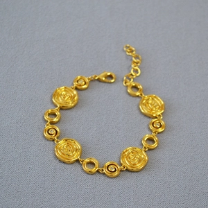 Vintage golden rose chain bracelet with irregular textures and adjustable lobster clasp