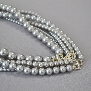 Multi-strand grey faux pearl necklace with elegant industrial style metal S-hook clasp