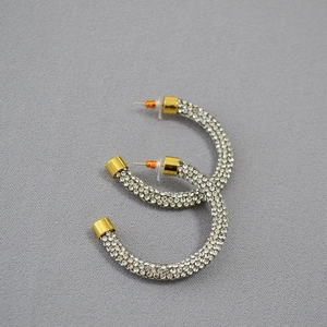 Sparkling gold-plated C-shaped hoop earrings with full pave cubic zirconia and S925 silver pins