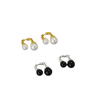 Minimalist U-shaped drop earrings with black onyx and white pearls in gold and silver