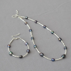 Baroque dark pearl necklace and bracelet set with silver irregular faceted beads