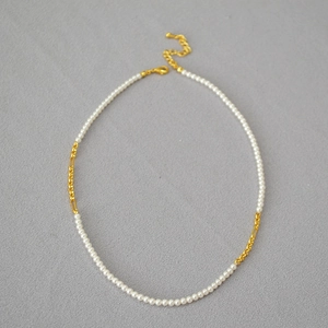 Elegant gold plated chain necklace with white pearls and adjustable lobster clasp