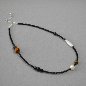 Artistic beaded necklace with black agate, tiger eye stones, and baroque pearls