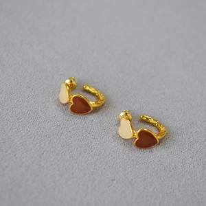 Vintage heart earrings with gold lava texture and brown enamel drops in retro style