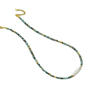 Vintage necklace with turquoise beads, golden spacers and a baroque pearl pendant