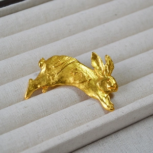 Handcrafted vintage gold rabbit brooch with star and moon engraving for sweaters