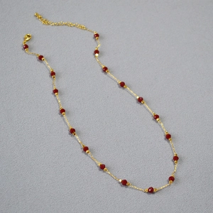 Minimalist brass gold plated necklace with faceted red cinnabar spinel beads and lobster clasp