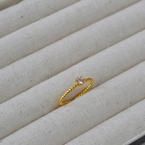 Minimalist 18K gold-plated braided open ring with crown-set sparkling cubic zirconia