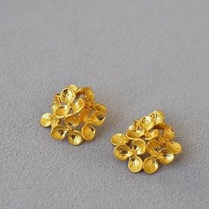 Vintage layered flower stud earrings in gold-plated brass with a textured 3D petal design