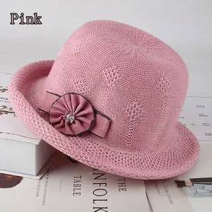 Pink knitted sun hat with floral detail and hollow jacquard pattern for women
