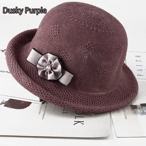 Dusky purple knitted cloche hat for women with elegant floral accent and breathable texture