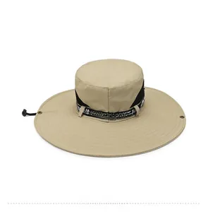 Detail of khaki wide brim sun hat with breathable mesh band and adjustable chin strap