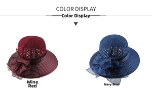 Detail view of foldable sun hats with mesh texture and large floral accents in wine and navy