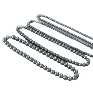 Three rows of grey Tahitian style pearl necklaces with magnetic metal sphere clasps