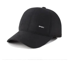 Detail view of the black wool baseball cap with metal Sport badge and thick warm texture