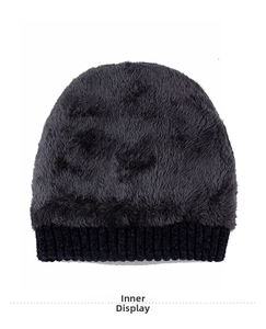 Detail of warm plush fleece lining in dark gray winter knitted beanie for men