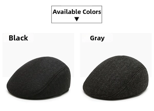 Detail view of thick wool blend newsboy caps in black and dark grey for winter