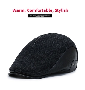 Detail of winter ivy cap featuring dark grey knit fabric and black faux leather panels