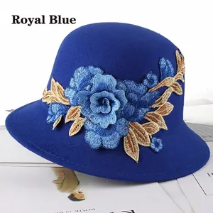 Royal blue cloche hat for women featuring elegant large 3D floral and gold leaf embroidery