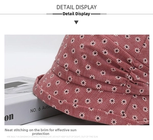 Close-up detail of floral sun hat featuring precise stitching and breathable fabric