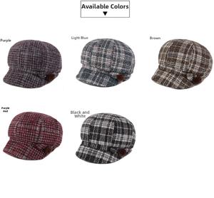 Detail view of colorful tweed baker boy caps with plush pompom accents for winter