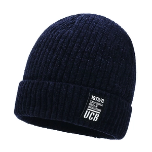 Men's navy blue chenille knit beanie with warm fleece lining and UCB vintage patch