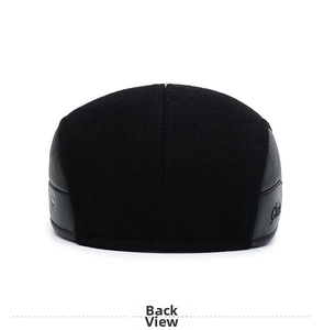 Rear view of black wool and leather newsboy cap showing detailed stitching and Classic logo