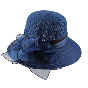 Navy knit sun hat with floral mesh embellishment and elegant wavy brim for women