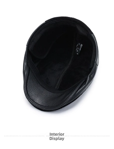 Detail view of winter hat showing warm black plush lining and foldable ear flaps