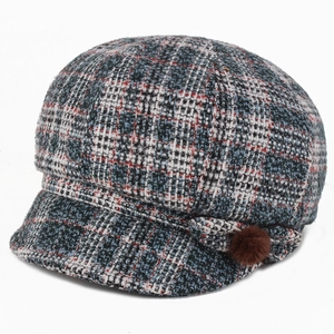Winter vintage plaid octagonal beret hat with colorful tweed pattern and faux fur pompom