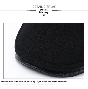 Detail of durable black cap brim with leather edge and reinforced inner layering