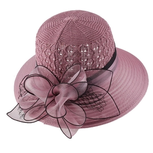 Elegant knit sun hat for women in dusty rose with large organza flower decoration