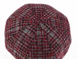 Top view of a padded multicolor tweed newsboy cap for women in autumn and winter