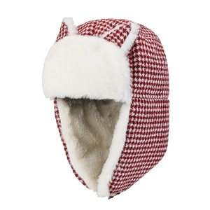 Detail of red houndstooth winter aviator hat with cat ears and white faux fur lining