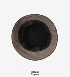 Detailed internal view showing black fabric lining and brown herringbone weave on brim