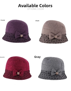 Close-up of winter cloche hats with bow and flower buckle in purple, khaki and grey