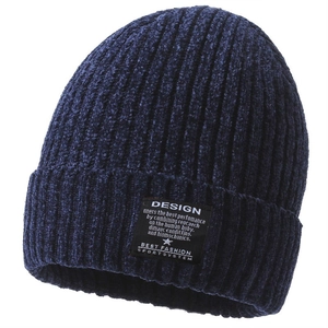 Detail of navy knit beanie showing thick vertical texture and fleece lining texture