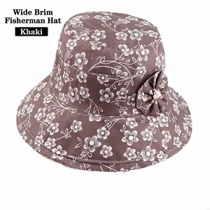 Khaki floral print bucket hat for women featuring a side bow and pearl detail