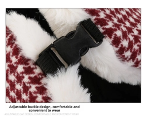 Detail of adjustable buckle and red houndstooth fabric on warm winter trapper hat