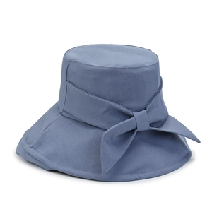 Morandi blue wide brim bucket hat for women featuring a large bow and woven texture