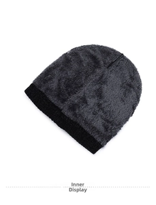 Detail view of winter knitted hat featuring thick grey faux fur lining for extra warmth
