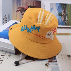 Yellow kids sun hat with 3D bunny ears and adjustable drawstring for outdoor beach sun protection