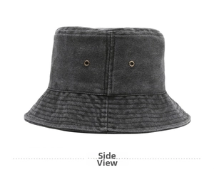 Close-up of charcoal grey washed denim bucket hat with metal eyelets and stitched brim