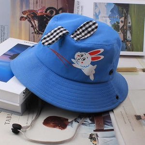 Blue kids sun hat with checkered bunny ears and white rabbit print for beach travel