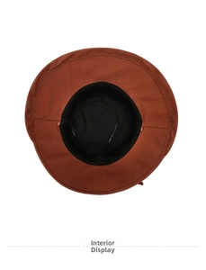 Close-up of the black hat lining with adjustable brown drawstring and neat stitching