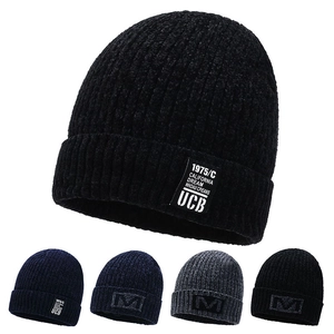 Winter chenille knitted beanie with warm fleece lining and UCB logo patch in black