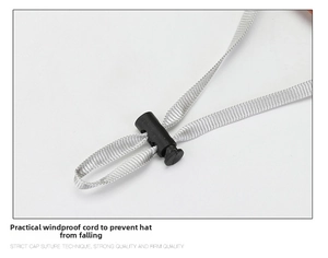 Adjustable windproof chin strap with light grey braided rope and black spring slider