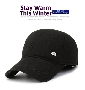Detail of black winter wool baseball cap featuring metal logo and Classic Cap embossed brim
