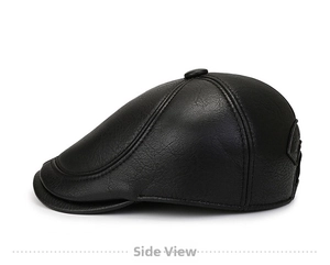 Detail view of the black faux leather flat cap showing premium texture and stitching