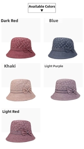 Détail de chapeaux de soleil pour femmes en cinq couleurs avec motifs floraux et nœuds